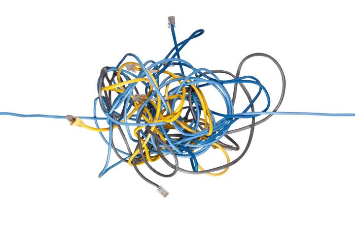 A tangled bundle of network cables.