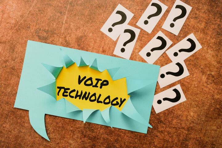 Phone icons and the word VoIP on a textured background.