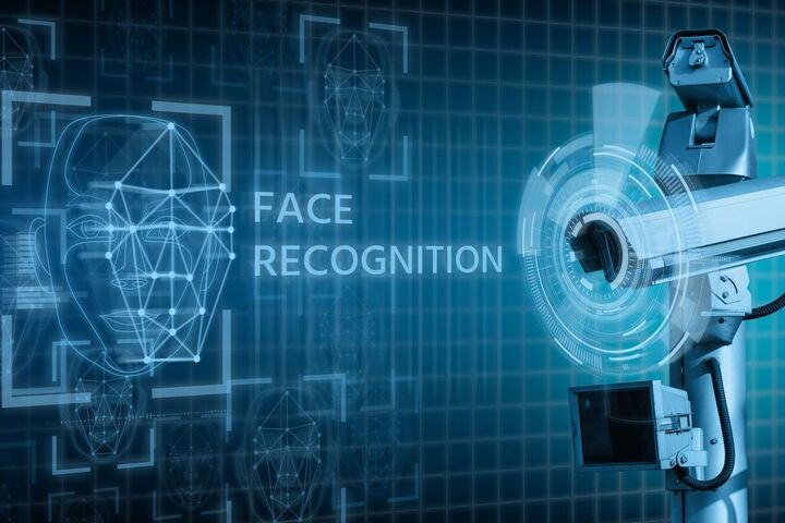 A face recognition scan over a city skyline.