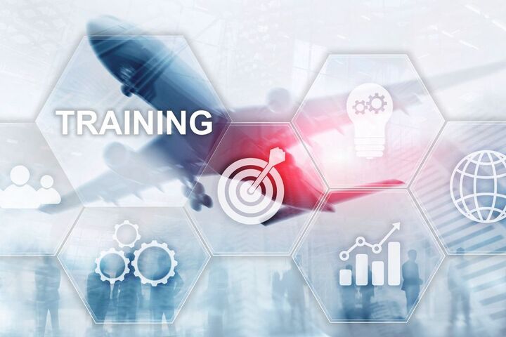 A training session with a presenter and a screen.